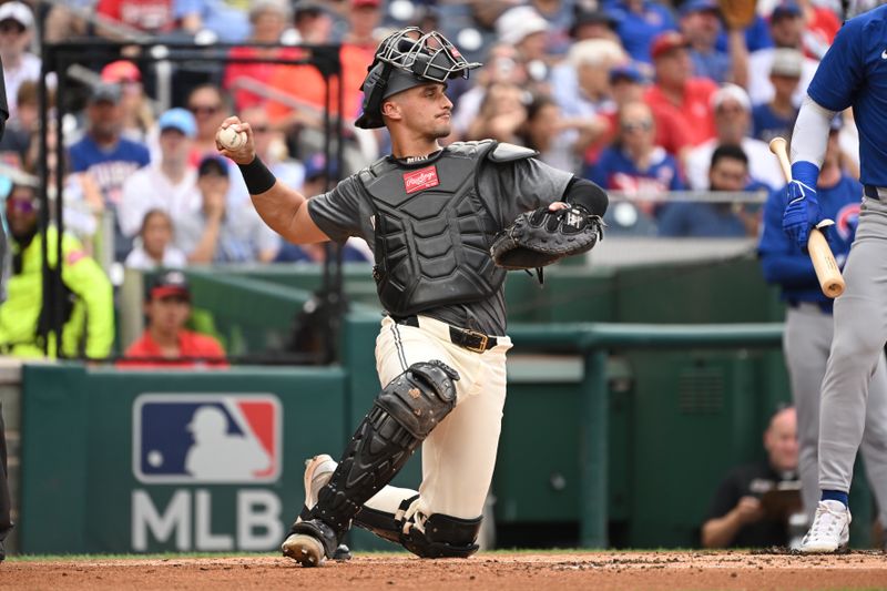 Aug 31, 2024; Washington, District of Columbia, USA; Washington Nationals catcher Drew Millas (81) throws the ball back to the pitcher against the Chicago Cubs during the second inning at Nationals Park. Mandatory Credit: Rafael Suanes-USA TODAY Sports