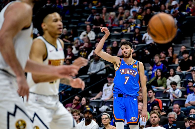 DENVER, COLORADO - OCTOBER 25: Chet Holmgren #7 of the Oklahoma City Thunder reacts after making a shot from the field in the first half against the Denver Nuggets at Ball Arena on October 15, 2024 in Denver, Colorado. NOTE TO USER: User expressly acknowledges and agrees that, by downloading and or using this photograph, User is consenting to the terms and conditions of the Getty Images License Agreement. (Photo by Dustin Bradford/Getty Images)