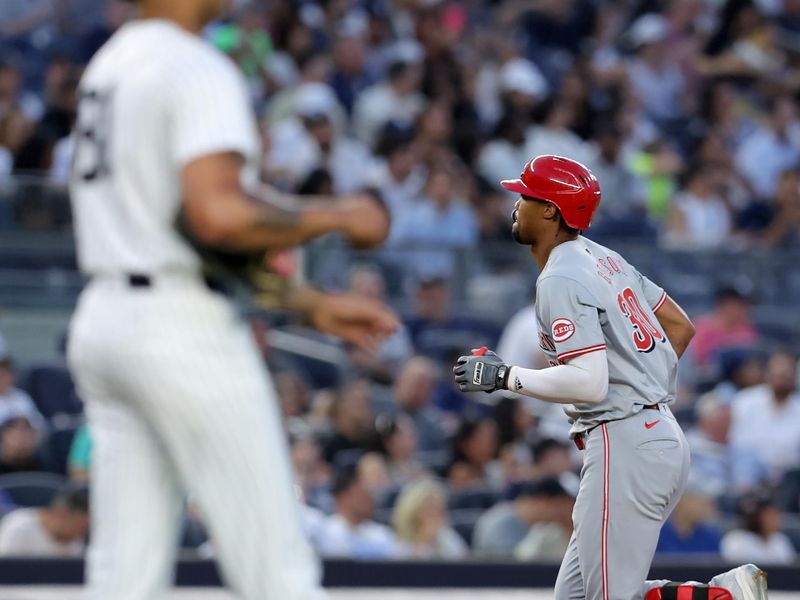 Jul 2, 2024; Bronx, New York, USA; Cincinnati Reds right fielder Will Benson (30) rounds the bases after hitting a two run home run against New York Yankees starting pitcher Luis Gil (81) during the fifth inning at Yankee Stadium. Mandatory Credit: Brad Penner-USA TODAY Sports