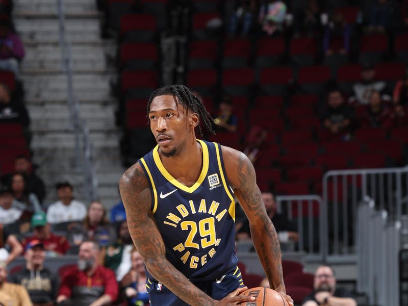 Cleveland, OH - OCTOBER 10: Quenton Jackson #29 of the Indiana Pacers dribbles the ball during the game against the Cleveland Cavaliers during a NBA pre season game on October 10, 2024 at Rocket Mortgage Fieldhouse in Cleveland, Ohio. NOTE TO USER: User expressly acknowledges and agrees that, by downloading and or using this photograph, User is consenting to the terms and conditions of the Getty Images License Agreement. Mandatory Copyright Notice: Copyright 2024 NBAE (Photo by Jeff Haynes/NBAE via Getty Images)