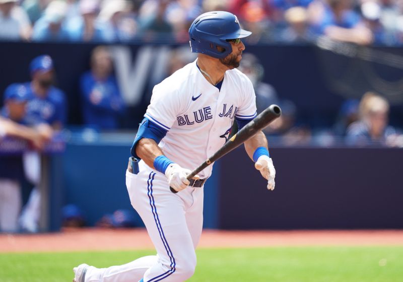 Jul 16, 2023; Toronto, Ontario, CAN; Toronto Blue Jays center fielder Kevin Kiermaier (39) hits an RBI single against the Arizona Diamondbacks during the second inning at Rogers Centre. Mandatory Credit: Nick Turchiaro-USA TODAY Sports