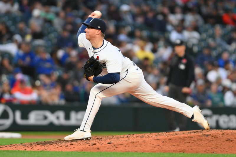 May 27, 2024; Seattle, Washington, USA; Seattle Mariners relief pitcher Trent Thornton (46) pitches to the Houston Astros during the seventh inning at T-Mobile Park. Mandatory Credit: Steven Bisig-USA TODAY Sports