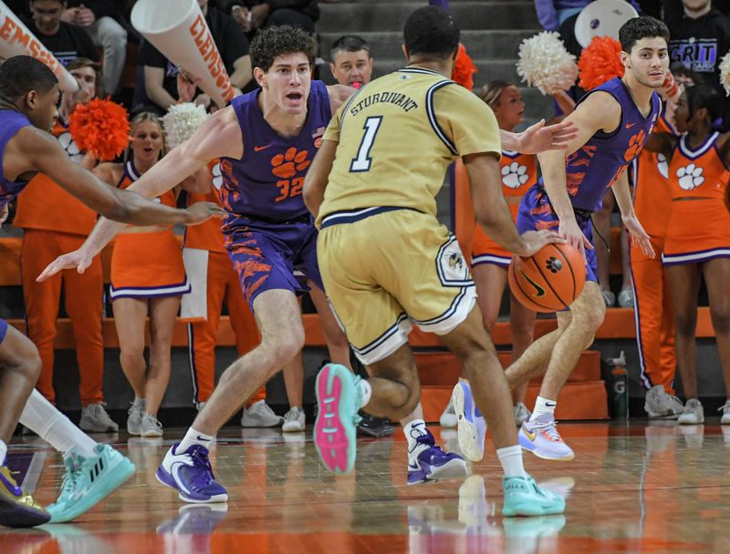 Jan 24, 2023; Clemson, South Carolina, USA; Clemson forward Daniel Nauseef (32) and \his brother Clemson senior guard Jack Nauseef (15) in the last minute with Georgia Tech guard Kyle Sturdivant (1) during the second half at Littlejohn Coliseum. Mandatory Credit: Ken Ruinard-USA TODAY Sports