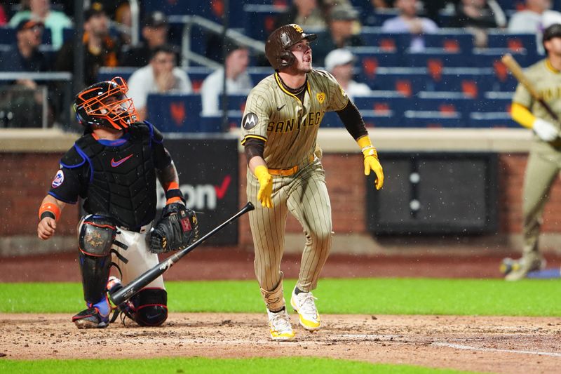 Jun 14, 2024; New York City, New York, USA; San Diego Padres second baseman Jake Cronenworth (9) watches his home rub against the New York Mets during the fifth inning at Citi Field. Mandatory Credit: Gregory Fisher-USA TODAY Sports