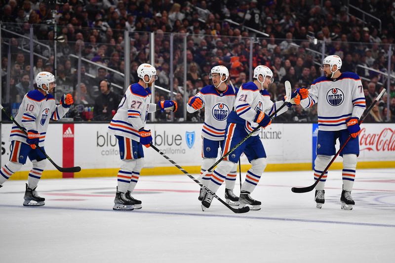 Apr 29, 2023; Los Angeles, California, USA; Edmonton Oilers center Klim Kostin (21) celebrates his goal scored against the Los Angeles Kings during the first period in game six of the first round of the 2023 Stanley Cup Playoffs at Crypto.com Arena. Mandatory Credit: Gary A. Vasquez-USA TODAY Sports