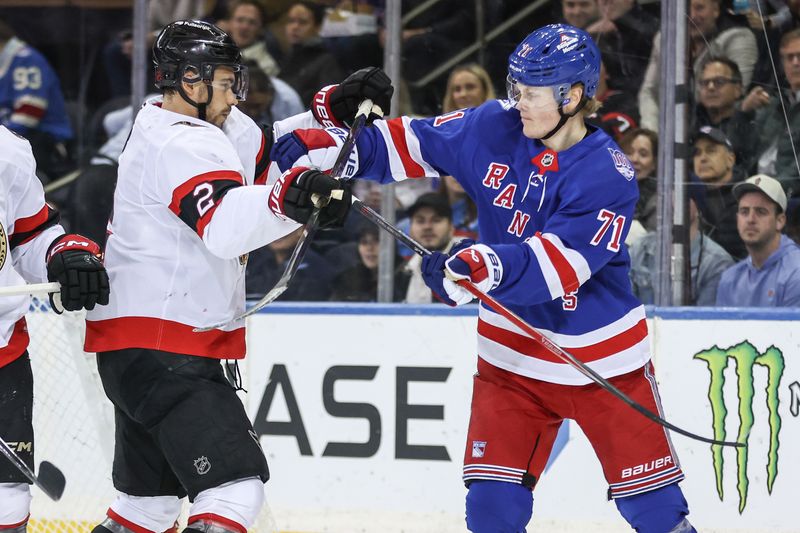 Mar 23, 2026; New York, New York, USA;  Ottawa Senators defenseman Artem Zub (2) and New York Rangers center Juuso Parssinen (71) get into an altercation in the first period at Madison Square Garden. Mandatory Credit: Wendell Cruz-Imagn Images