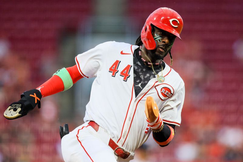 Sep 17, 2024; Cincinnati, Ohio, USA; Cincinnati Reds shortstop Elly De La Cruz (44) scores on a RBI single hit by catcher Tyler Stephenson (not pictured) in the first inning against the Atlanta Braves at Great American Ball Park. Mandatory Credit: Katie Stratman-Imagn Images