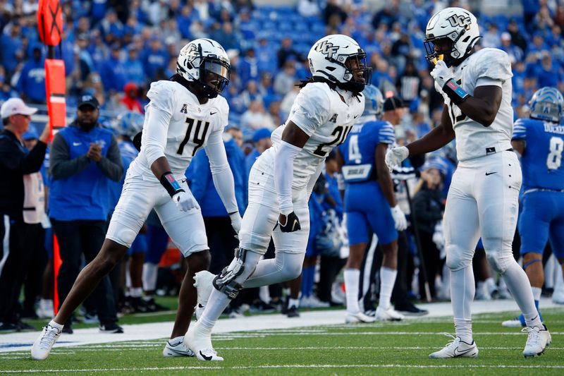 Nov 5, 2022; Memphis, Tennessee, USA; UCF Knights defensive back Jarvis Ware (24) reacts after a defensive stop during the second half against the Memphis Tigers at Liberty Bowl Memorial Stadium. Mandatory Credit: Petre Thomas-USA TODAY Sports