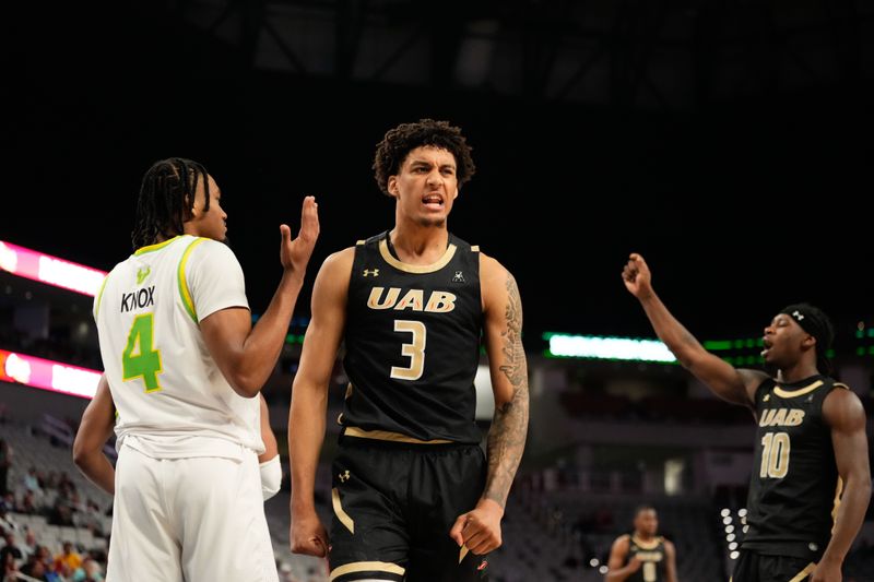 Mar 16, 2024; Fort Worth, TX, USA;  UAB Blazers forward Yaxel Lendeborg (3) reacts after a score against South Florida Bulls guard Kobe Knox (4) during the second half at Dickies Arena. Mandatory Credit: Chris Jones-USA TODAY Sports