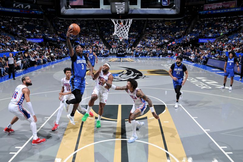 ORLANDO, FL - NOVEMBER 15: Kentavious Caldwell-Pope #3 of the Orlando Magic shoots the ball during the game against the Philadelphia 76ers during the Emirates NBA Cup game on  November 15, 2024 at Kia Center in Orlando, Florida. NOTE TO USER: User expressly acknowledges and agrees that, by downloading and or using this photograph, User is consenting to the terms and conditions of the Getty Images License Agreement. Mandatory Copyright Notice: Copyright 2024 NBAE (Photo by Fernando Medina/NBAE via Getty Images)