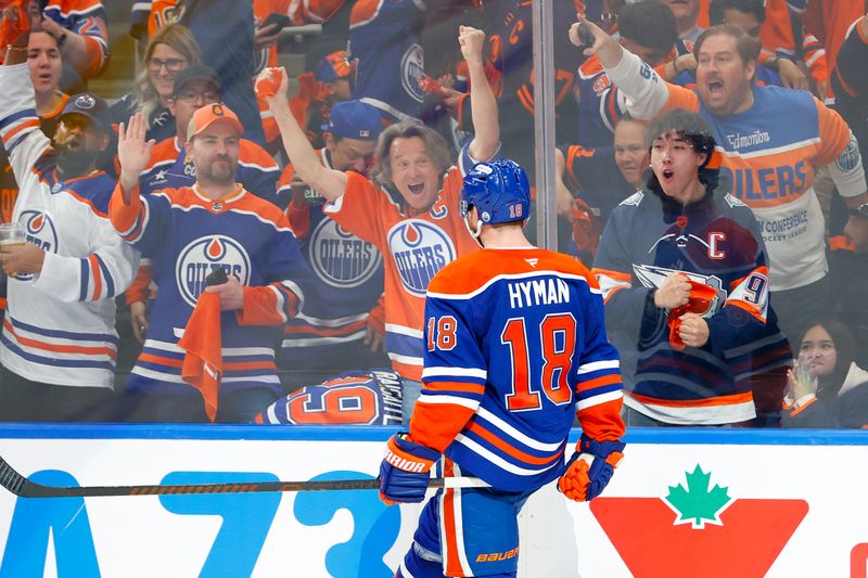 May 25, 2025; Edmonton, Alberta, CAN; Edmonton Oilers left wing Zach Hyman (18) celebrates after he scores a goal against the Dallas Stars during the third period in game three of the Western Conference Final of the 2025 Stanley Cup Playoffs at Rogers Place. Mandatory Credit: Perry Nelson-Imagn Images