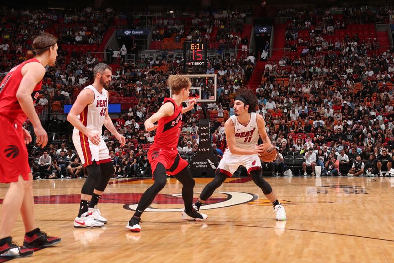 MIAMI, FL - APRIL 12: Jaime Jaquez Jr. #11 of the Miami Heat dribbles the ball during the game against the Toronto Raptors  on April 12, 2024 at Kaseya Center in Miami, Florida. NOTE TO USER: User expressly acknowledges and agrees that, by downloading and or using this Photograph, user is consenting to the terms and conditions of the Getty Images License Agreement. Mandatory Copyright Notice: Copyright 2024 NBAE (Photo by Issac Baldizon/NBAE via Getty Images)