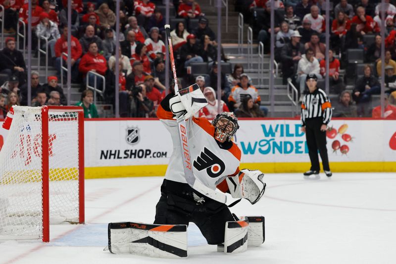 Jan 25, 2024; Detroit, Michigan, USA;  Philadelphia Flyers goaltender Samuel Ersson (33) makes a save in the second period against the Detroit Red Wings at Little Caesars Arena. Mandatory Credit: Rick Osentoski-USA TODAY Sports