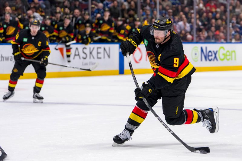 Mar 25, 2024; Vancouver, British Columbia, CAN; Vancouver Canucks forward J.T. Miller (9) shoots against the Los Angeles Kings in the third period at Rogers Arena. Kings won 3 -2. Mandatory Credit: Bob Frid-USA TODAY Sports