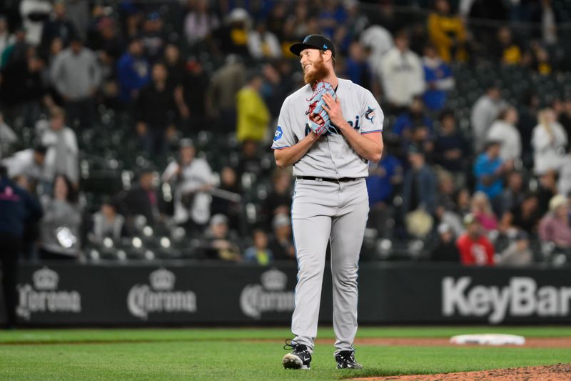 Jun 14, 2023; Seattle, Washington, USA; Miami Marlins relief pitcher A.J. Puk (35) reacts to the final out of the game against the Seattle Mariners at T-Mobile Park. Mandatory Credit: Steven Bisig-USA TODAY Sports