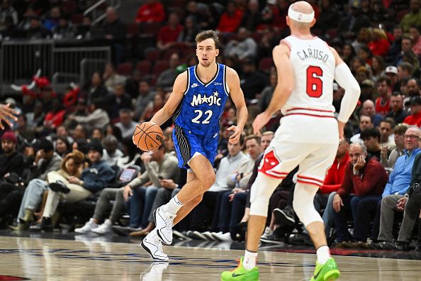 CHICAGO, ILLINOIS - NOVEMBER 15:  Franz Wagner #22 of the Orlando Magic controls the ball against the Chicago Bulls on November 15, 2023 at United Center in Chicago, Illinois.   NOTE TO USER: User expressly acknowledges and agrees that, by downloading and or using this photograph, User is consenting to the terms and conditions of the Getty Images License Agreement.  (Photo by Jamie Sabau/Getty Images)