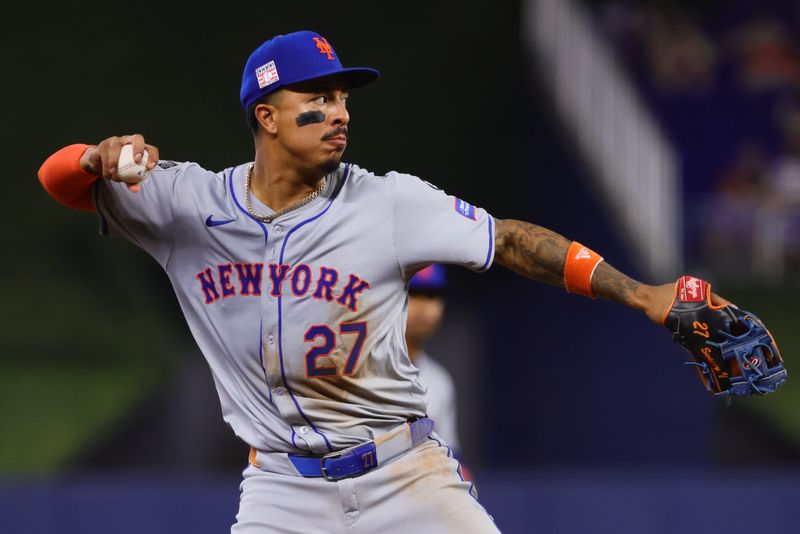 Jul 21, 2024; Miami, Florida, USA; New York Mets third baseman Mark Vientos (27) throws to first base to retire Miami Marlins center fielder Vidal Brujan (not pictured) during the seventh inning at loanDepot Park. Mandatory Credit: Sam Navarro-USA TODAY Sports