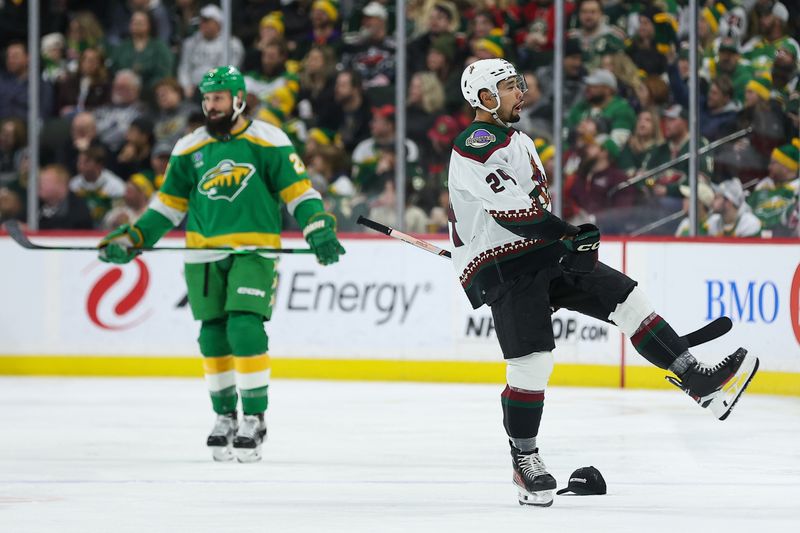 Jan 13, 2024; Saint Paul, Minnesota, USA; Arizona Coyotes defenseman Matt Dumba (24) celebrates after center Nick Bjugstad (17) scored a hat-trick against the Minnesota Wild during the second period at Xcel Energy Center. Mandatory Credit: Matt Krohn-USA TODAY Sports