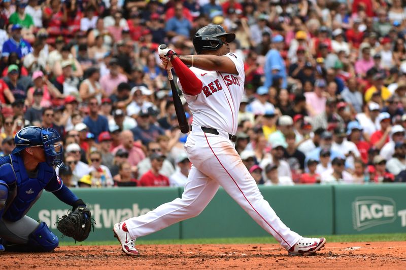 Jul 14, 2024; Boston, Massachusetts, USA;  Boston Red Sox third baseman Rafael Devers (11) hits a double during the third inning against the Kansas City Royals at Fenway Park. Mandatory Credit: Bob DeChiara-USA TODAY Sports