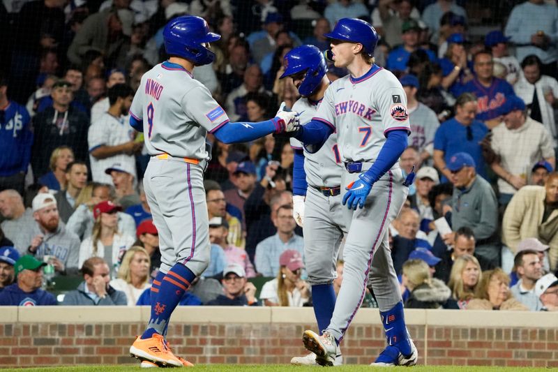 Sep 25, 2025; Chicago, Illinois, USA; New York Mets third base Brett Baty (7) is greeted by Brandon Nimmo (9) after hitting a three-run home run against the Chicago Cubs during the fourth inning at Wrigley Field. Mandatory Credit: David Banks-Imagn Images