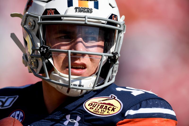 Jan 1, 2020; Tampa, Florida, USA; Auburn Tigers quarterback Bo Nix (10) warms up prior to the game between the Auburn Tigers and the Minnesota Golden Gophers at Raymond James Stadium. Mandatory Credit: Douglas DeFelice-USA TODAY Sports