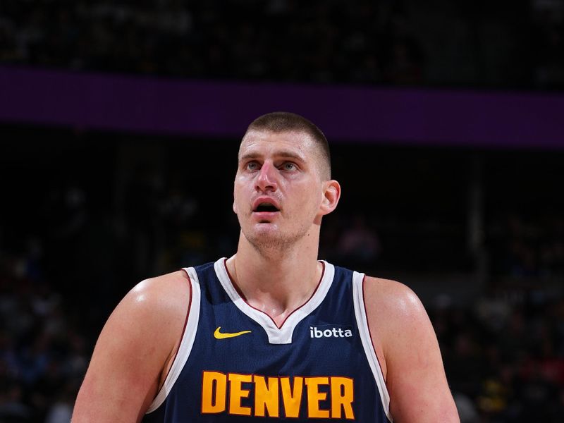 DENVER, CO - FEBRUARY 14: Nikola Jokic #15 of the Denver Nuggets prepares to shoot a free throw during the game against the Sacramento Kingson February 14, 2024 at the Ball Arena in Denver, Colorado. NOTE TO USER: User expressly acknowledges and agrees that, by downloading and/or using this Photograph, user is consenting to the terms and conditions of the Getty Images License Agreement. Mandatory Copyright Notice: Copyright 2024 NBAE (Photo by Garrett Ellwood/NBAE via Getty Images)