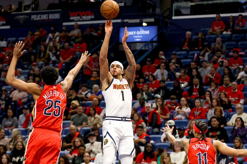 NEW ORLEANS, LOUISIANA - NOVEMBER 15:  Michael Porter Jr. #1 of the Denver Nuggets shoots over Trey Murphy III #25 of the New Orleans Pelicans during the first half of an Emirates NBA Cup game at the Smoothie King Center on November 15, 2024 in New Orleans, Louisiana. NOTE TO USER: User expressly acknowledges and agrees that, by downloading and or using this photograph, User is consenting to the terms and conditions of the Getty Images License Agreement. (Photo by Derick E. Hingle/Getty Images)