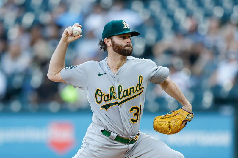 Aug 25, 2023; Chicago, Illinois, USA; Oakland Athletics starting pitcher Zach Neal (31) delivers a pitch against the Chicago White Sox during the first inning at Guaranteed Rate Field. Mandatory Credit: Kamil Krzaczynski-USA TODAY Sports