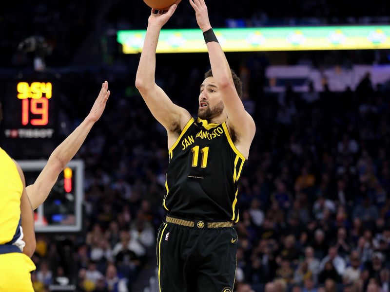 SAN FRANCISCO, CALIFORNIA - MARCH 22: Klay Thompson #11 of the Golden State Warriors shoots the ball against the Indiana Pacers in the first half at Chase Center on March 22, 2024 in San Francisco, California. NOTE TO USER: User expressly acknowledges and agrees that, by downloading and or using this photograph, User is consenting to the terms and conditions of the Getty Images License Agreement.  (Photo by Ezra Shaw/Getty Images)