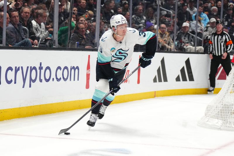 Dec 20, 2023; Los Angeles, California, USA; Seattle Kraken defenseman Will Borgen (3) skates with the puck against the LA Kings in the second period at Crypto.com Arena. Mandatory Credit: Kirby Lee-USA TODAY Sports