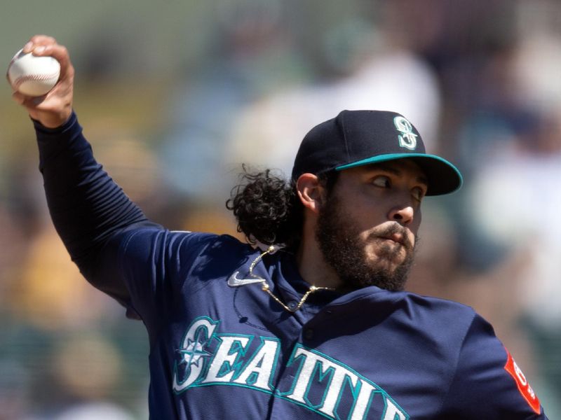 May 7, 2025; West Sacramento, California, USA; Seattle Mariners pitcher Andrés Muñoz (75) delivers a pitch against the Athletics during the ninth inning at Sutter Health Park. Mandatory Credit: D. Ross Cameron-Imagn Images