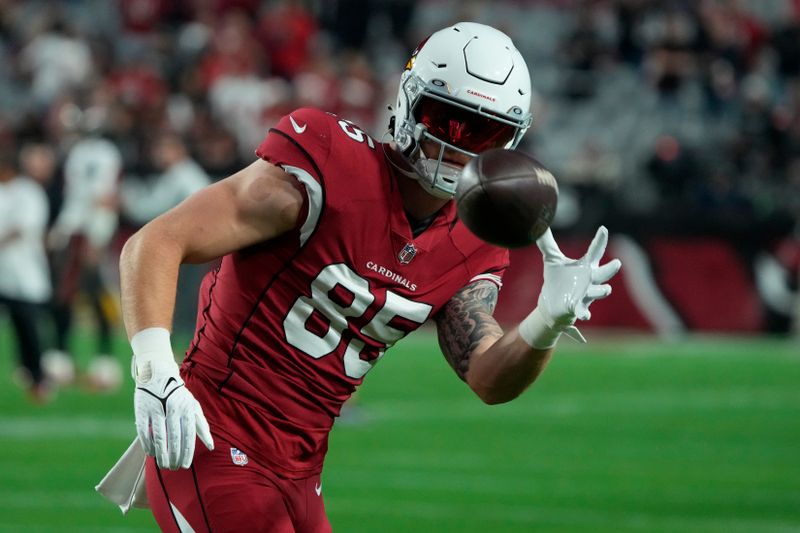 Arizona Cardinals tight end Trey McBride (85) warms up prior to an NFL football game against the Tampa Bay Buccaneers, Sunday, Dec. 25, 2022, in Glendale, Ariz. (AP Photo/Rick Scuteri)