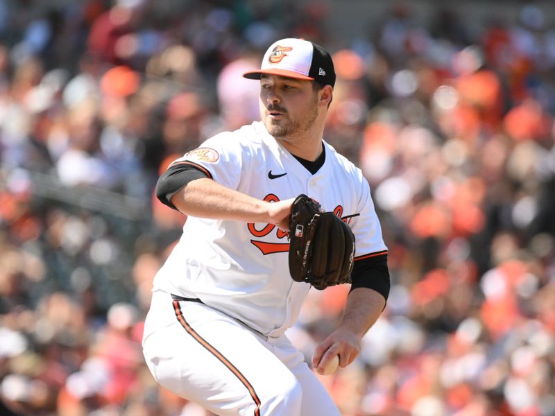 Apr 28, 2024; Baltimore, Maryland, USA;  Baltimore Orioles relief pitcher Keegan Akin (45) delivers a pitch during the fifth inning against the Oakland Athletics at Oriole Park at Camden Yards. Mandatory Credit: James A. Pittman-USA TODAY Sports