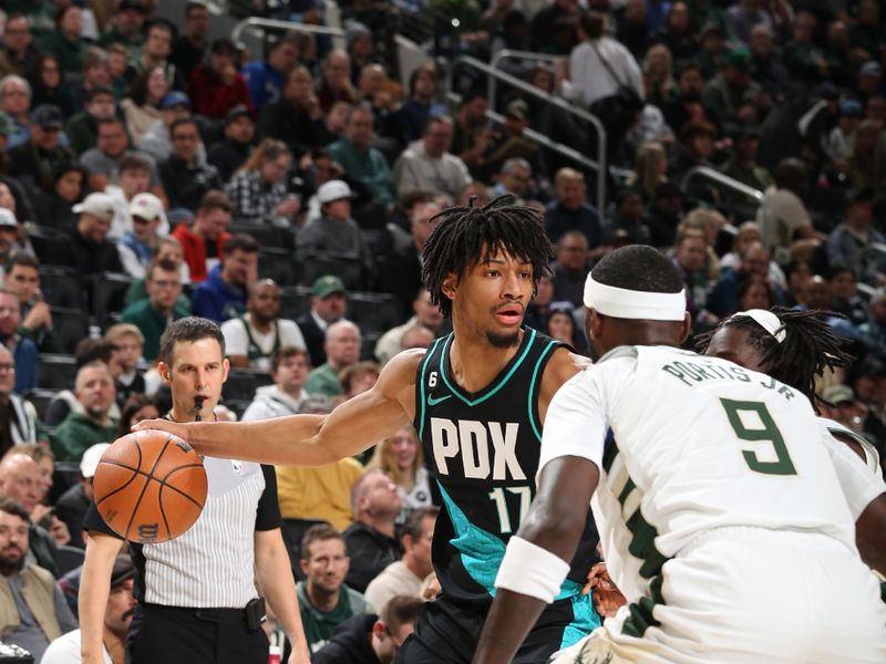 MILWAUKEE, WI - NOVEMBER 21: Shaedon Sharpe #17 of the Portland Trail Blazers dribbles the ball during the game against the Milwaukee Bucks on November 21, 2022 at the Fiserv Forum Center in Milwaukee, Wisconsin. NOTE TO USER: User expressly acknowledges and agrees that, by downloading and or using this Photograph, user is consenting to the terms and conditions of the Getty Images License Agreement. Mandatory Copyright Notice: Copyright 2022 NBAE (Photo by Gary Dineen/NBAE via Getty Images).