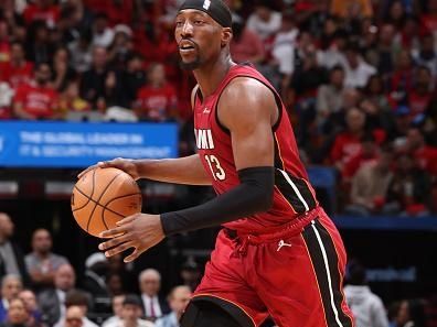 MIAMI, FL - DECEMBER 25: Bam Adebayo #13 of the Miami Heat handles the ball during the game against the Philadelphia 76ers on December 25, 2023 at Kaseya Center in Miami, Florida. NOTE TO USER: User expressly acknowledges and agrees that, by downloading and or using this Photograph, user is consenting to the terms and conditions of the Getty Images License Agreement. Mandatory Copyright Notice: Copyright 2023 NBAE (Photo by David Sherman/NBAE via Getty Images)