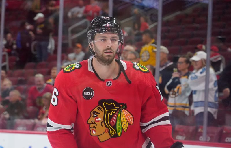 Oct 24, 2023; Chicago, Illinois, USA; Chicago Blackhawks center Jason Dickinson (16) warms up before the game against the Boston Bruins at United Center. Mandatory Credit: David Banks-USA TODAY Sports