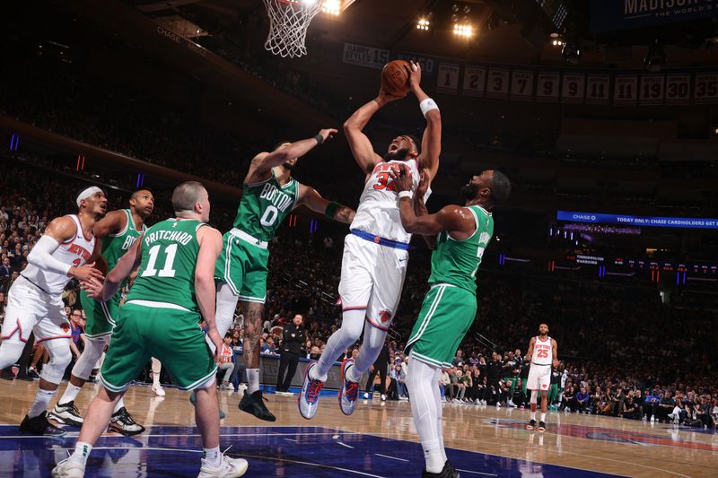 NEW YORK, NY - May 10:    Karl-Anthony Towns #32 of the New York Knicks drives to the basket during the game against the Boston Celtics  during Round 2 Game 3 of the 2025 NBA Playoffs  on May 10, 2025 at Madison Square Garden in New York City, New York.  NOTE TO USER: User expressly acknowledges and agrees that, by downloading and or using this photograph, User is consenting to the terms and conditions of the Getty Images License Agreement. Mandatory Copyright Notice: Copyright 2025 NBAE  (Photo by Nathaniel S. Butler/NBAE via Getty Images)