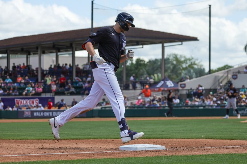 Mar 23, 2024; Lakeland, Florida, USA; Detroit Tigers center fielder Parker Meadows (22) rounds third on a home run during the second inning against the New York Yankees at Publix Field at Joker Marchant Stadium. Mandatory Credit: Mike Watters-USA TODAY Sports