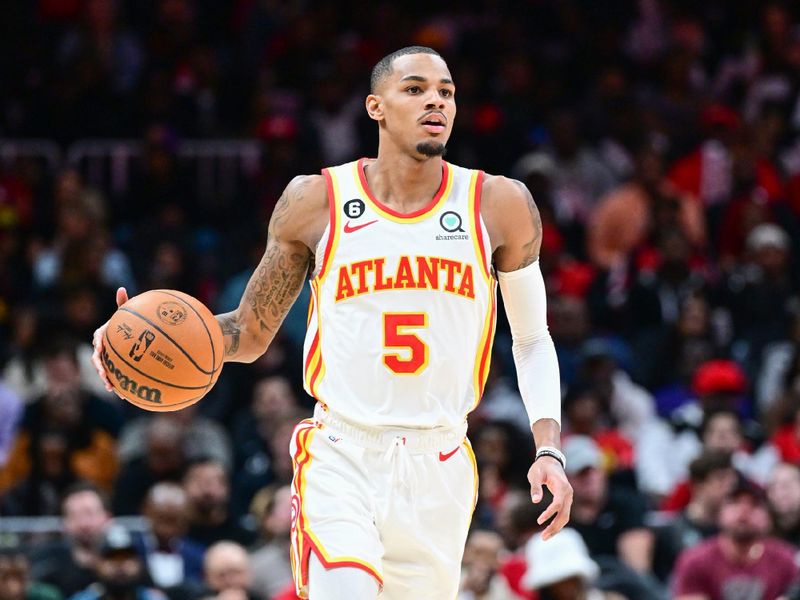 ATLANTA, GA - FEBUARY 9: Dejounte Murray #5 of the Atlanta Hawks goes to the basket during the game  on Febuary 9, 2023 at State Farm Arena in Atlanta, Georgia.  NOTE TO USER: User expressly acknowledges and agrees that, by downloading and/or using this Photograph, user is consenting to the terms and conditions of the Getty Images License Agreement. Mandatory Copyright Notice: Copyright 2023 NBAE (Photo by Adam Hagy/NBAE via Getty Images)