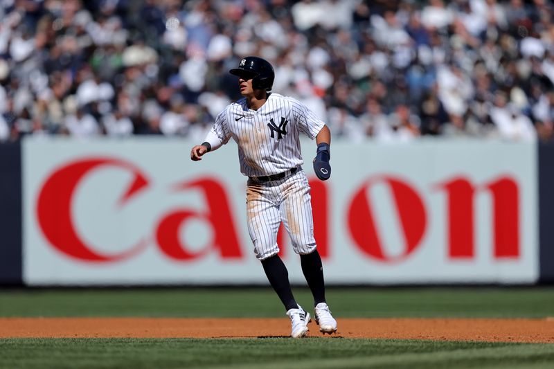 Mar 30, 2023; Bronx, New York, USA; New York Yankees shortstop Anthony Volpe (11) leads off second base during the third inning against the San Francisco Giants at Yankee Stadium. Mandatory Credit: Brad Penner-USA TODAY Sports