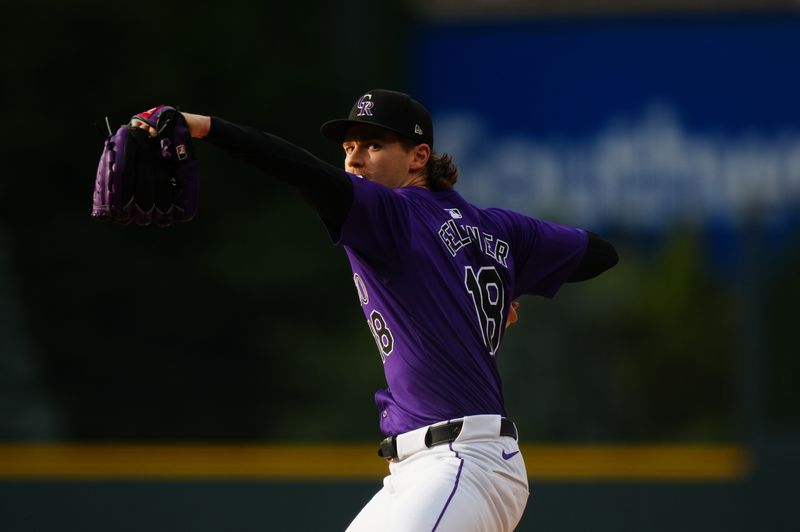 Jun 14, 2024; Denver, Colorado, USA; Colorado Rockies starting pitcher Ryan Feltner (18) delivers a pitch in the first inning against the Pittsburgh Pirates at Coors Field. Mandatory Credit: Ron Chenoy-USA TODAY Sports