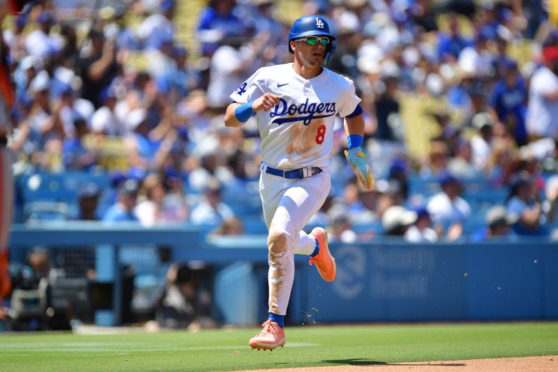 Jul 25, 2024; Los Angeles, California, USA; Los Angeles Dodgers third baseman Enrique Hernández (8) runs home to score against the San Francisco Giants during the fourth inning at Dodger Stadium. Mandatory Credit: Gary A. Vasquez-USA TODAY Sports