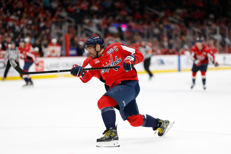 Feb 25, 2025; Washington, District of Columbia, USA; Washington Capitals left wing Alex Ovechkin (8) shoots the puck against the Calgary Flames in the third period at Capital One Arena. Mandatory Credit: Geoff Burke-Imagn Images