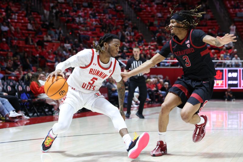 Feb 29, 2024; Salt Lake City, Utah, USA; Utah Utes guard Deivon Smith (5) dribbles against Stanford Cardinal guard Kanaan Carlyle (3) during the second half at Jon M. Huntsman Center. Mandatory Credit: Rob Gray-USA TODAY Sports