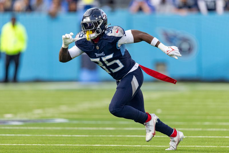 Tennessee Titans safety K'Von Wallace (35) runs to a play during their NFL football game against the Indianapolis Colts Sunday, Dec. 3, 2023, in Nashville, Tenn. (AP Photo/Wade Payne)