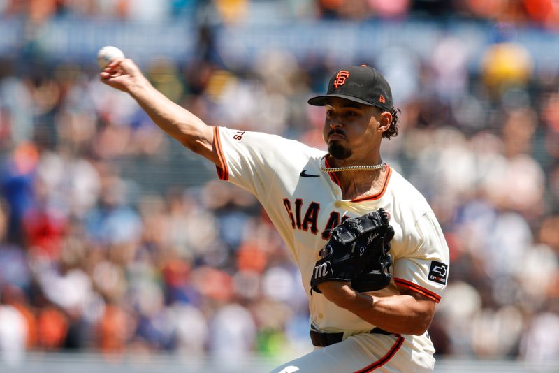 Jul 11, 2024; San Francisco, California, USA; San Francisco Giants pitcher Jordan Hicks (12) throws a pitch during the first inning against the Toronto Blue Jays at Oracle Park. Mandatory Credit: Sergio Estrada-USA TODAY Sports
