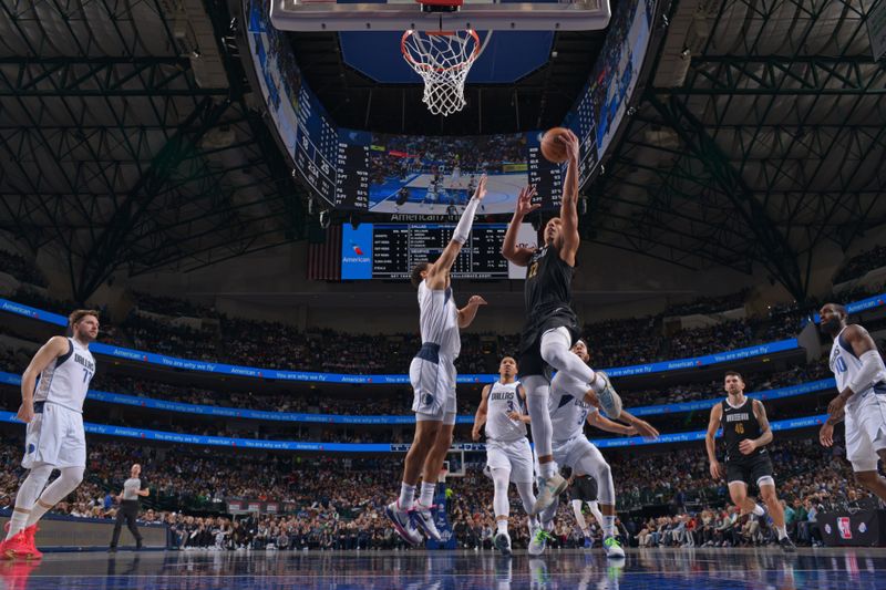 DALLAS, TX - JANUARY 9: Desmond Bane #22 of the Memphis Grizzlies shoots the ball during the game against the Dallas Mavericks on January 9, 2024 at the American Airlines Center in Dallas, Texas. NOTE TO USER: User expressly acknowledges and agrees that, by downloading and or using this photograph, User is consenting to the terms and conditions of the Getty Images License Agreement. Mandatory Copyright Notice: Copyright 2024 NBAE (Photo by Glenn James/NBAE via Getty Images)