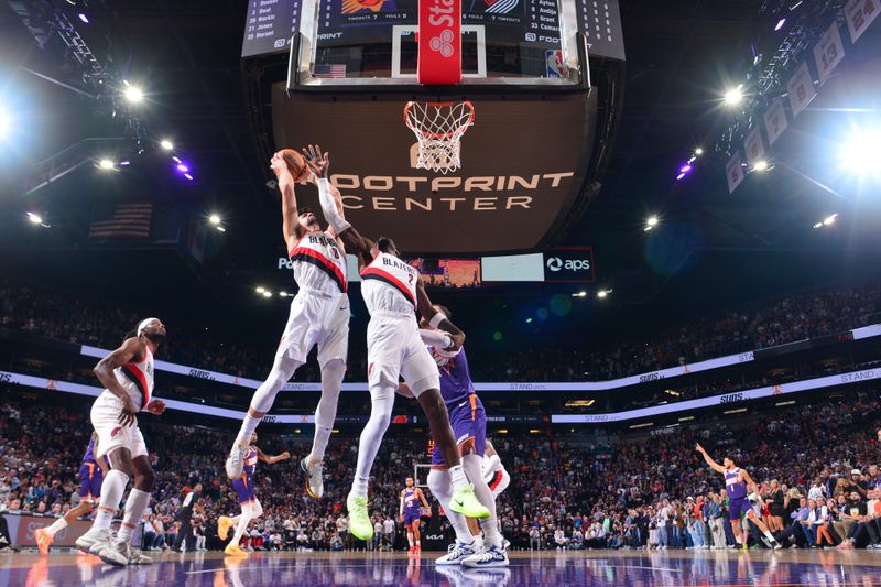 PHOENIX, AZ - NOVEMBER 2: Deni Avdija #8 of the Portland Trail Blazers grabs the rebound during the game Phoenix Suns on November 2, 2024 at Footprint Center in Phoenix, Arizona. NOTE TO USER: User expressly acknowledges and agrees that, by downloading and or using this photograph, user is consenting to the terms and conditions of the Getty Images License Agreement. Mandatory Copyright Notice: Copyright 2024 NBAE (Photo by Kate Frese/NBAE via Getty Images)