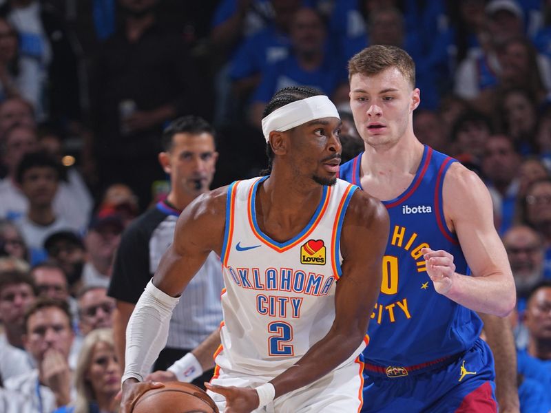 OKLAHOMA CITY, OK - MAY 13:  Shai Gilgeous-Alexander #2 of the Oklahoma City Thunder dribbles the ball during the game against the Denver Nuggets  during Round 2 Game 5 of the 2025 NBA Playoffs on May 13, 2025 at Paycom Center in Oklahoma City, Oklahoma. NOTE TO USER: User expressly acknowledges and agrees that, by downloading and or using this photograph, User is consenting to the terms and conditions of the Getty Images License Agreement. Mandatory Copyright Notice: Copyright 2025 NBAE (Photo by Garrett Ellwood/NBAE via Getty Images)