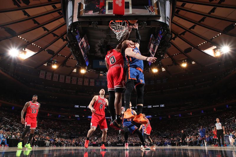 NEW YORK, NY - APRIL 14: Donte Divincenzo #0 of the New York Knicks shoots the ball during the game against the Chicago Bulls  on April 14, 2024 at Madison Square Garden in New York City, New York.  NOTE TO USER: User expressly acknowledges and agrees that, by downloading and or using this photograph, User is consenting to the terms and conditions of the Getty Images License Agreement. Mandatory Copyright Notice: Copyright 2024 NBAE  (Photo by Nathaniel S. Butler/NBAE via Getty Images)